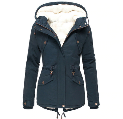 Vrouwelijke warme en comfortabele jas